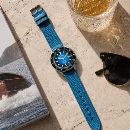 Blue leather strap by vild Hamburg, mounted on a Squale 1521 diver's watch and shown from above with decoration