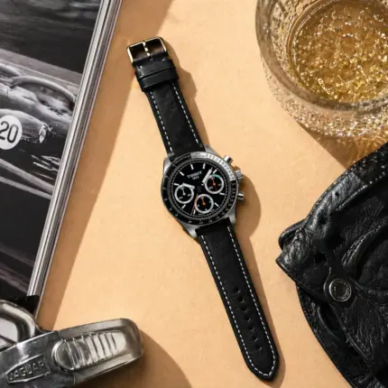 Black leather strap by vild Hamburg, mounted on a Tissot PRS 516 and shown decoratively from above.