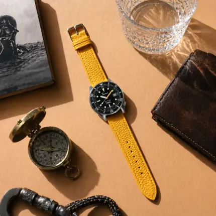Mustard leather bracelet by vild Hamburg, mounted on a Squale 1521 Militaire and photographed from above with decoration