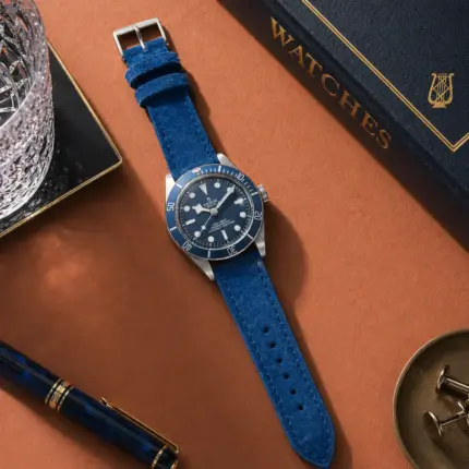 Blue suede strap by vild Hamburg, mounted on a Tudor Black Bay Fifty-Eight and shown from above with decoration