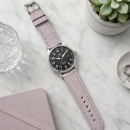 Lilac suede strap from vild Hamburg, mounted on an IWC Pilot's Watch Mark XVIII and photographed from above with decoration