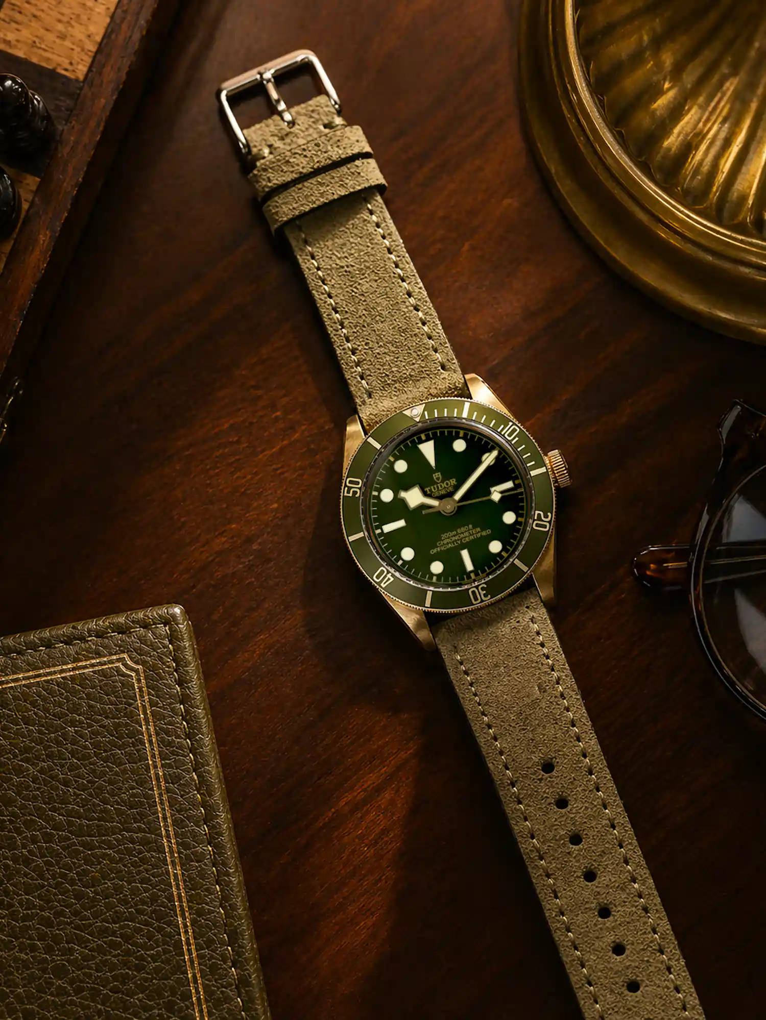 vild-watch strap-suede-olive-Tudor Black Bay Fifty-Eight ref M79018V 3zu4 Olive suede strap by vild Hamburg, mounted on a Tudor Black Bay Fifty-Eight and photographed decoratively from above.