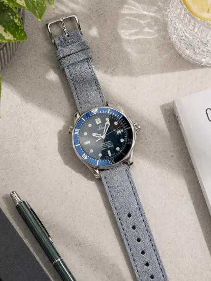 Light blue suede watch strap from vild Hamburg on an Omega Seamaster Professional 300m with the ref. 2531.80.00-2 and decoration