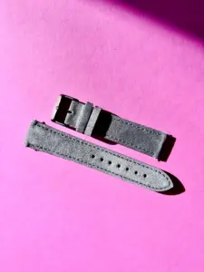 dark grey suede watch strap in sunlight against a colored background by vild Hamburg